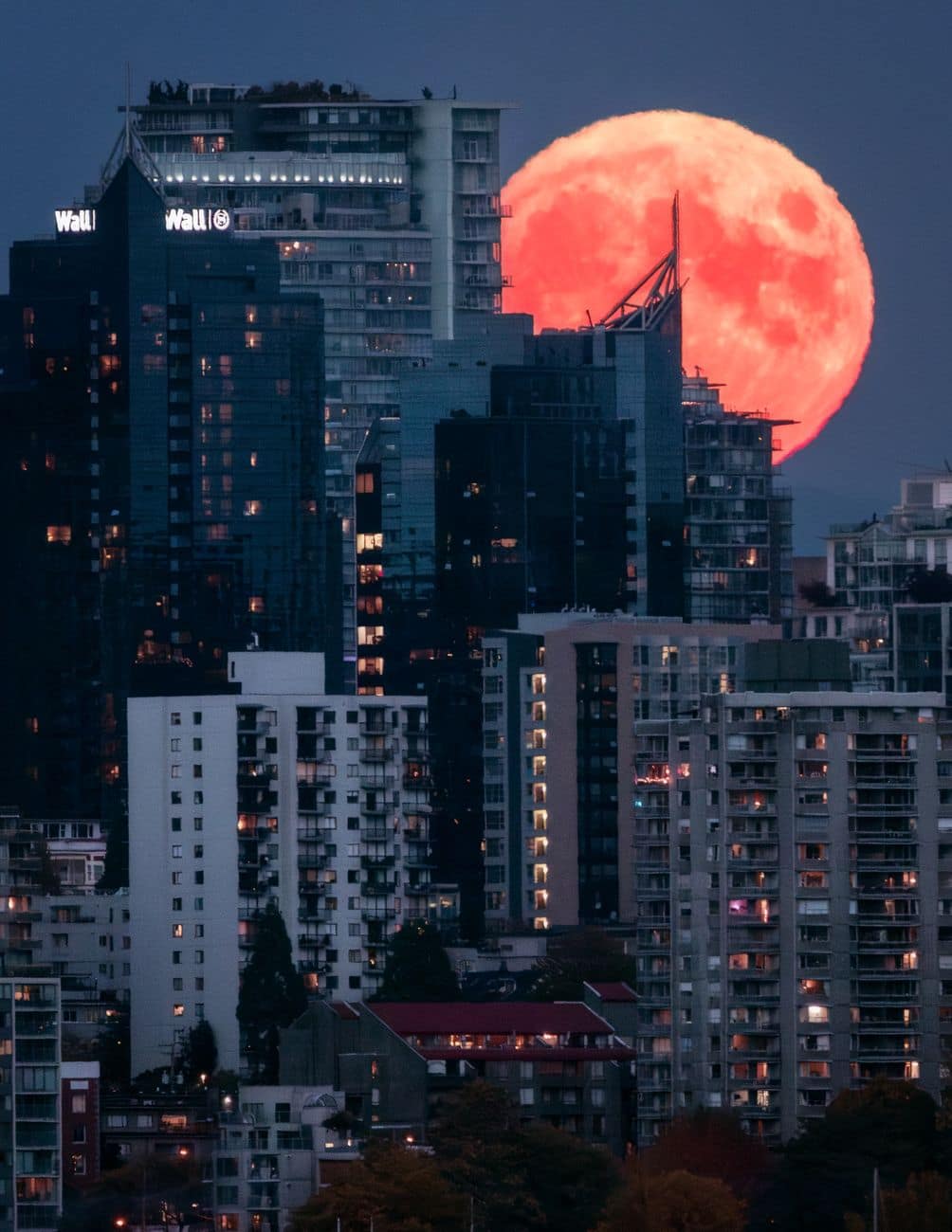 vancouver full moon over city skyline