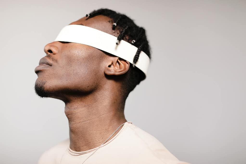 close up shot of a blindfolded man
