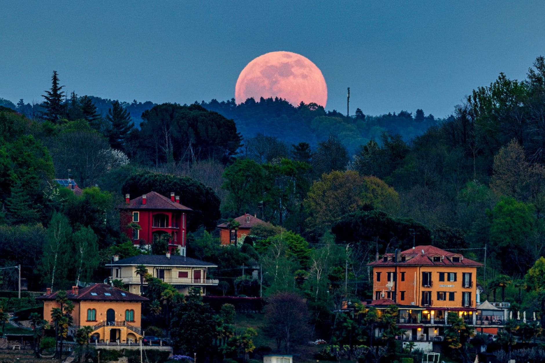 moonrise over scenic village landscape