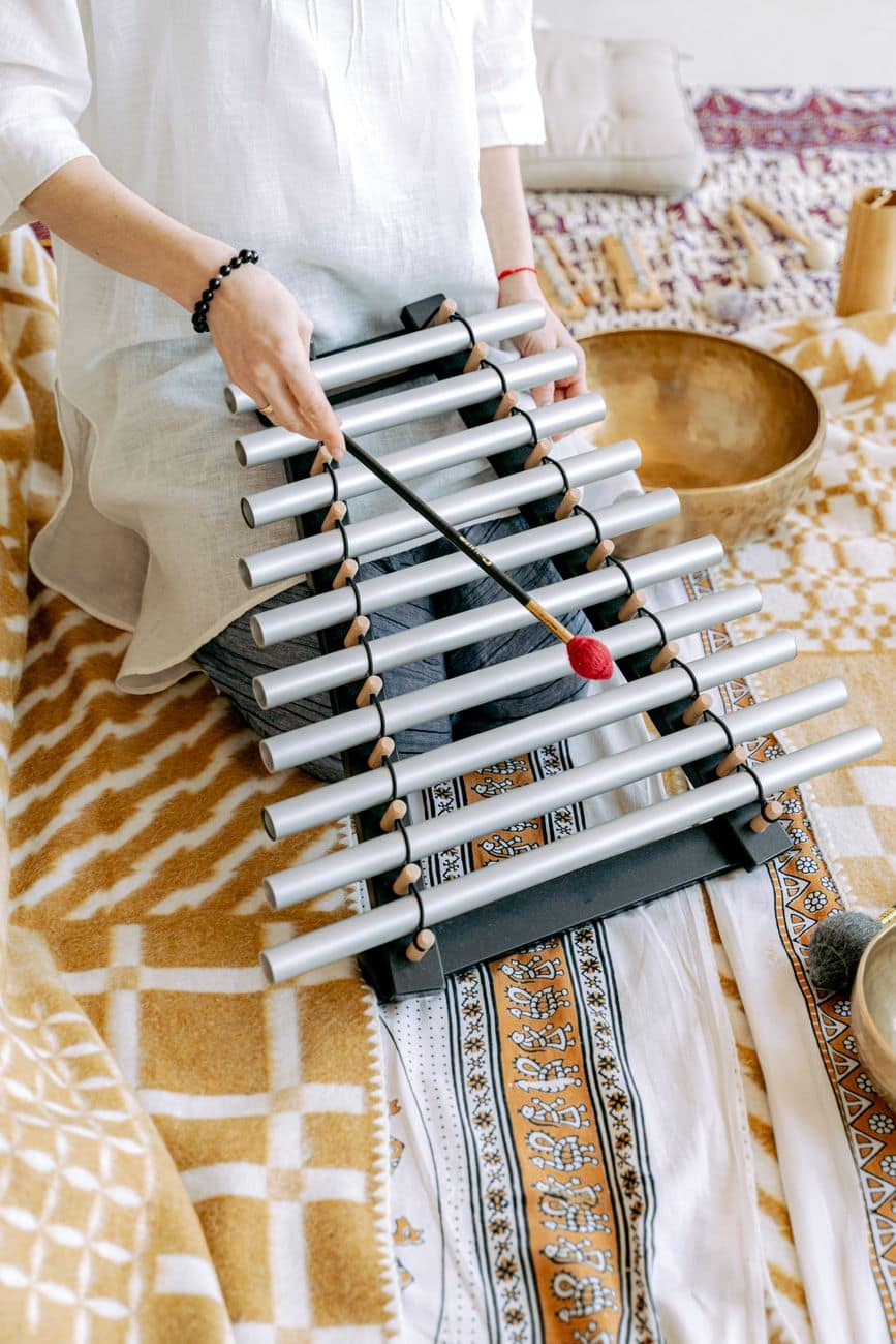 person using a xylophone